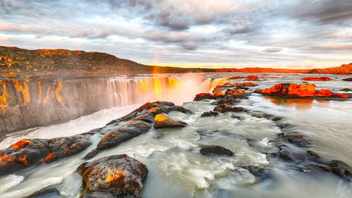 Preview: Dramatic sunset view of fantastic waterfall and cascades of Selfoss waterfall.