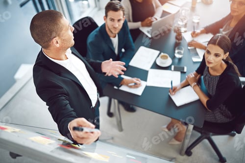 Preview: This is how we will better the company. Shot of businesspeople having a meeting in a boardroom.