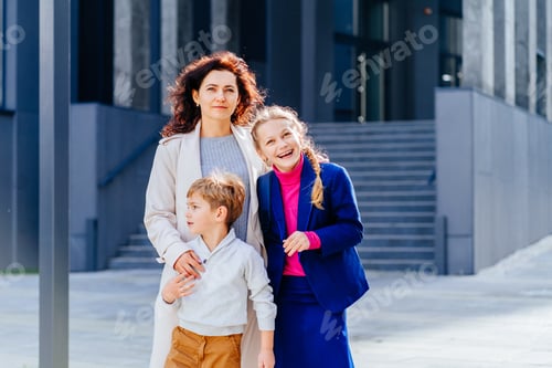 Preview: Smiling Family Portrait in an Urban Setting