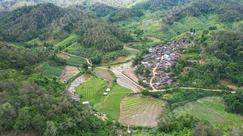Preview: Aerial view from drone of the rural village and rice terraces in the mountains