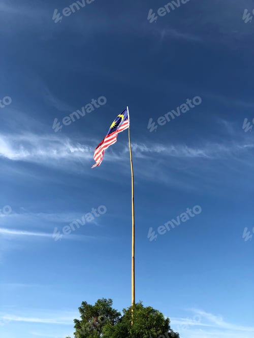 Preview: Waving Flag Against a Brilliant Blue Sky