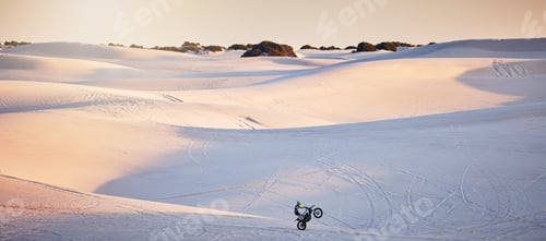 Preview: Desert, motorcycle and athlete doing a sport jump for outdoor competition, training or exercise. Ex