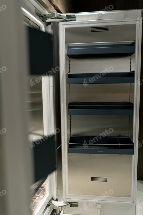 Preview: close-up of a professional kitchen with metal doors of an empty refrigerator for food storage