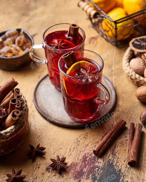 Preview: Two glasses of mulled wine on wooden background