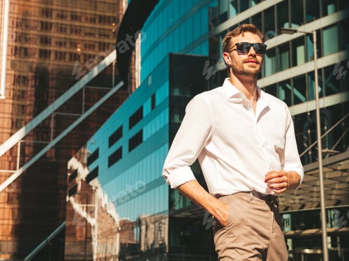 Preview: Handsome man posing outdoors