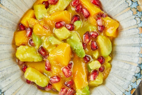 Preview: Mango salad with avocado and pomegranate seeds. French gourmet cuisine