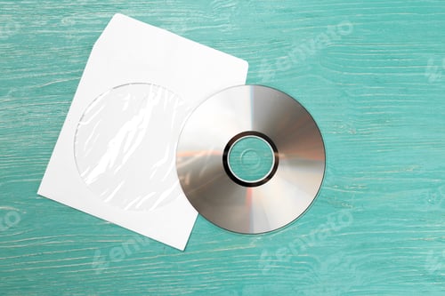 Preview: CD disk on wooden table