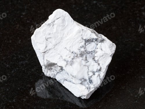 Preview: raw Howlite stone on black granite