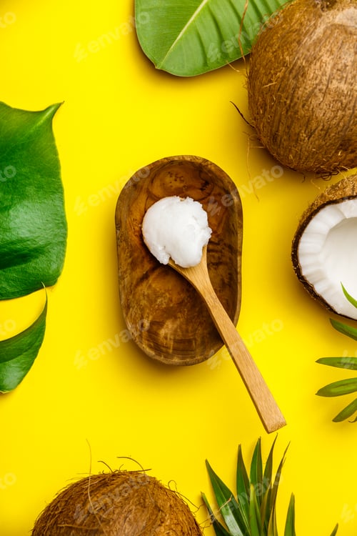 Preview: Coconut oil, tropical leaves and fresh coconuts