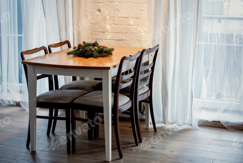 Preview: Christmas tree branch decoration on table