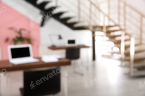 Preview: Modern brightly lit office with bokeh effect