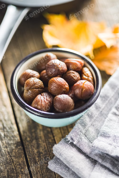 Preview: Peeled chestnuts. Sweet roasted chestnuts in bowl.
