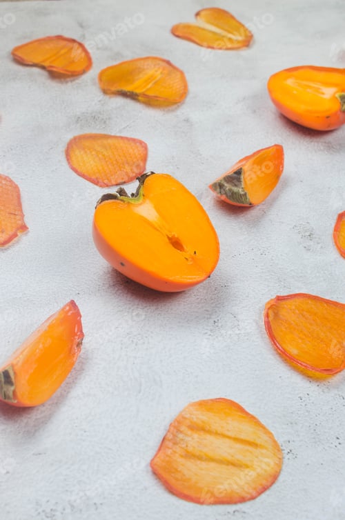 Preview: persimmon with dried pineapple wedges