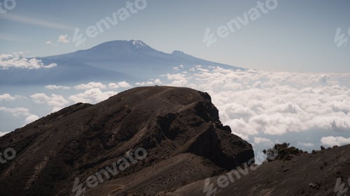 Preview: Reaching mount meru summit with kilimanjaro in the background