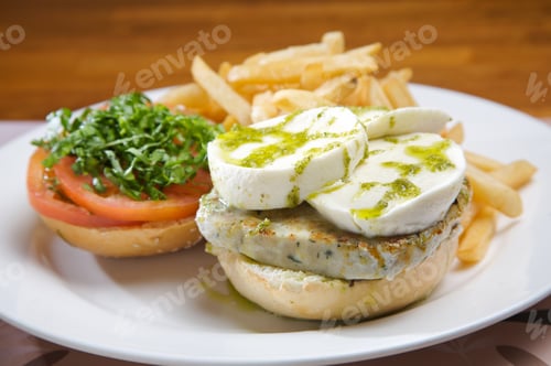 Preview: Turkey burger with goat cheese and olive oil. served with french fries.