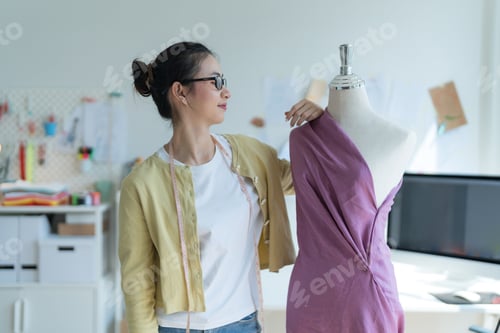 Preview: fashion designer woman Happy to design clothes.