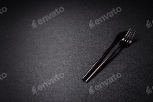Preview: Kitchen knife and fork made of steel with copy space