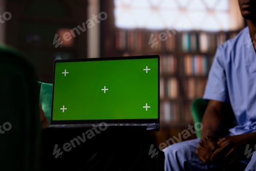 Preview: African American medical assistant facing stress and grief next to isolated display