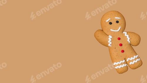 Preview: Christmas gingerbread man on a brown background. New Year's banner. Copy space
