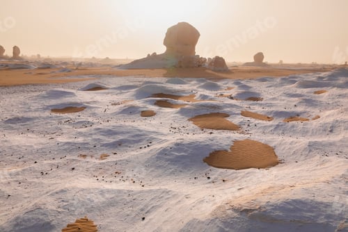 Preview: Limestone rocks in the White Desert at sunset. Egypt, mushroom rocks in the desert