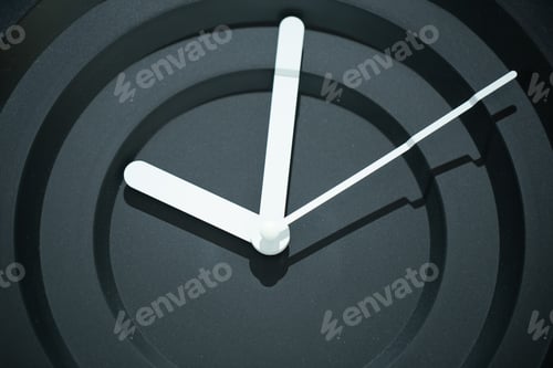 Preview: Decorative stylish modern black wall clock. Close up.