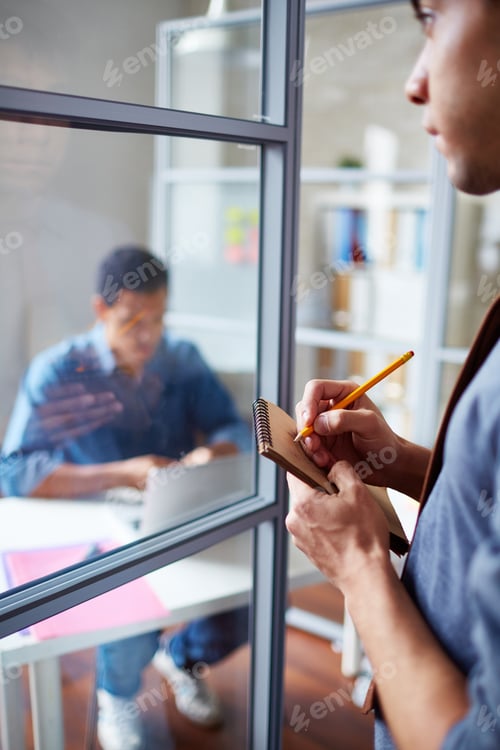 Preview: Businessman with notepad
