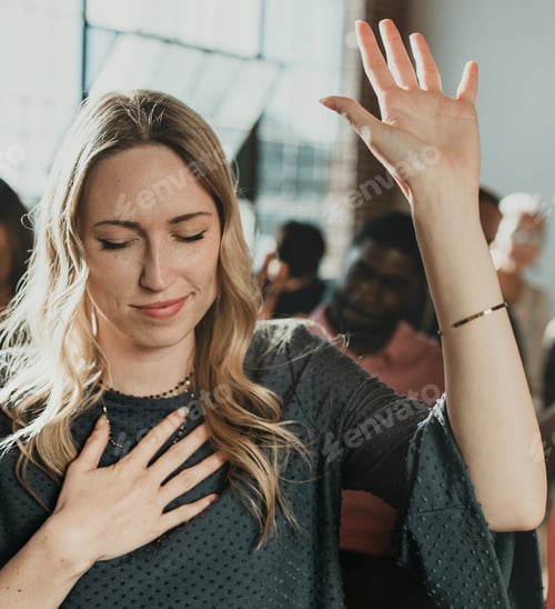 Preview: White woman raising her hand
