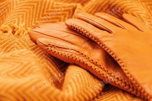 Preview: Soft wool scarf with orange leather gloves close-up