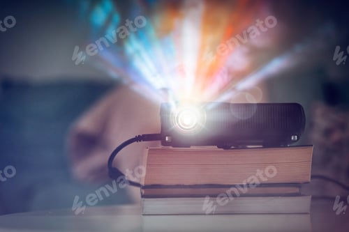 Preview: Small LCD video projector on table in living room, watching movies in home theater