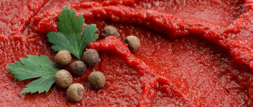 Preview: Tomato paste with peppercorn and parsley on whole background