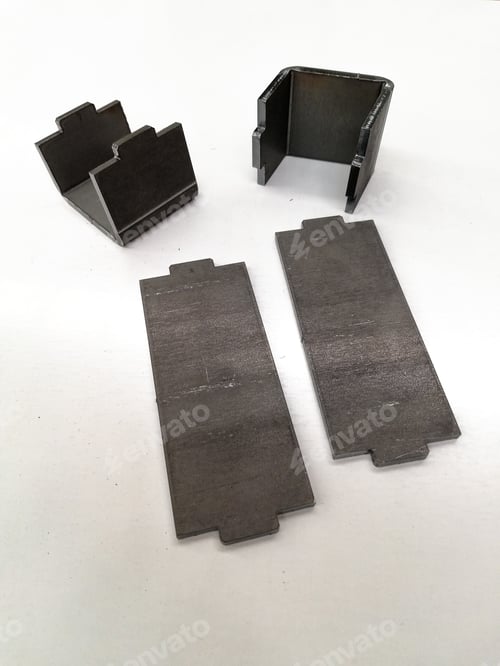 Preview: Vertical shot of parts before and after bending comparison on a white background