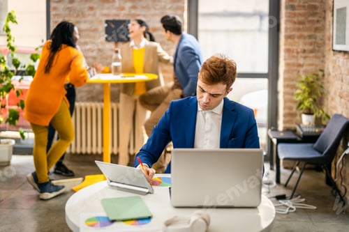 Preview: Business team working in a start-up office