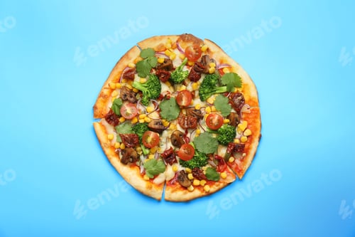 Preview: Delicious vegetarian pizza with mushrooms, vegetables and parsley on light blue background, top view