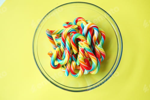 Preview: mini cherry candy canes on yellow background