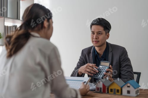 Preview: Sealing a deal. Asian people business real estate agent with client consulting and discussing at