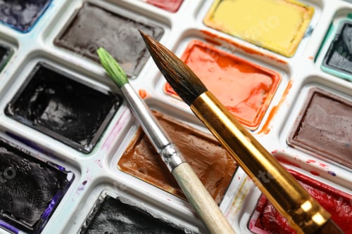 Preview: Palette of watercolors with brushes, close up