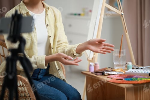 Preview: Teacher conducting online painting lesson at home, closeup. Time for hobby