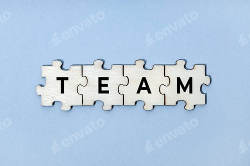 Preview: Team word on wooden puzzle pieces