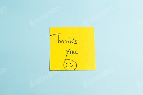 Preview: A yellow sticky note with a smiley face on it that says "Thank you you"
