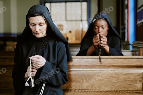 Preview: Diverse Nuns Praying In Church
