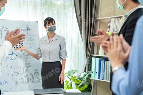 Preview: Asian businesswoman leader report work to colleague team while brainstorm in meeting room