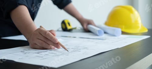 Preview: Architects or engineers working construction and drawing construction plans