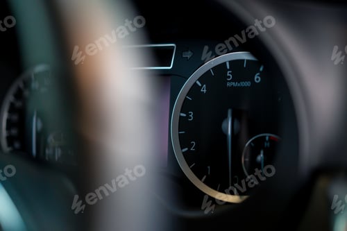 Preview: Close-up of the odometer and dashboard of luxury car with a black interior after detailing