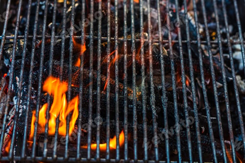 Preview: Empty hot charcoal barbecue grill with bright flame. Hot burning grill, outdoors cooking food