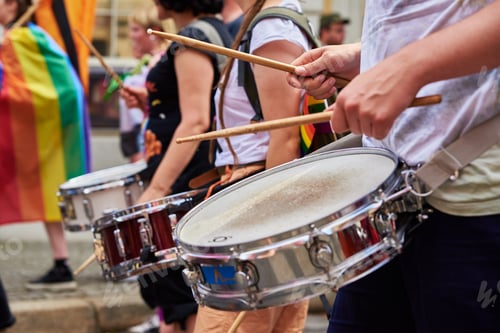 Preview: People with drums in street at demonstration in city