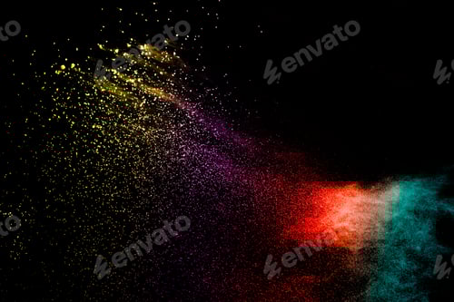 Preview: Explosion of colorful Holi powder on black background.