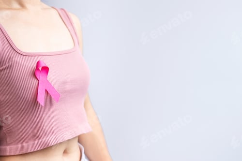 Preview: Woman Wearing Pink Ribbon for Breast Cancer Awareness