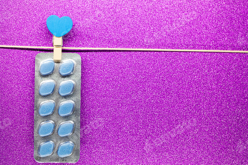 Preview: Pill for men's health and Valentine day background.