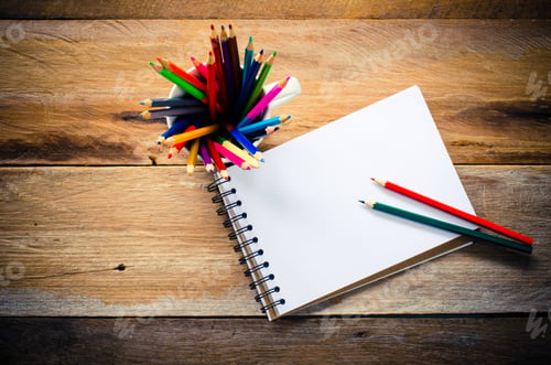 Preview: Crayons and notebooks.