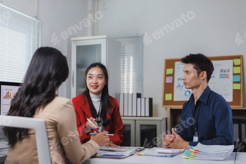 Preview: Business team collaborating during an office meeting